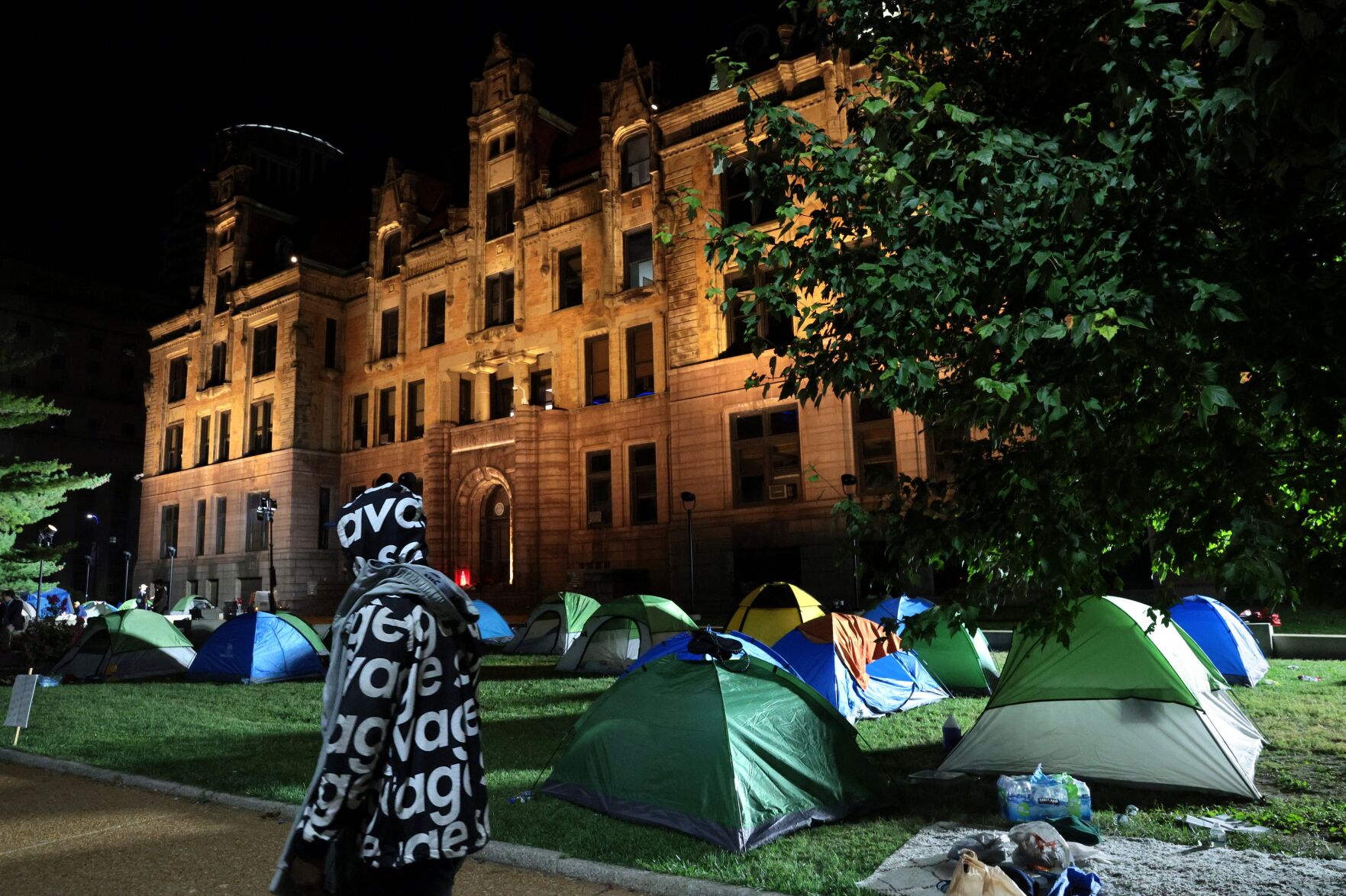 City Hall tent camp, threatened with closure, survives the night